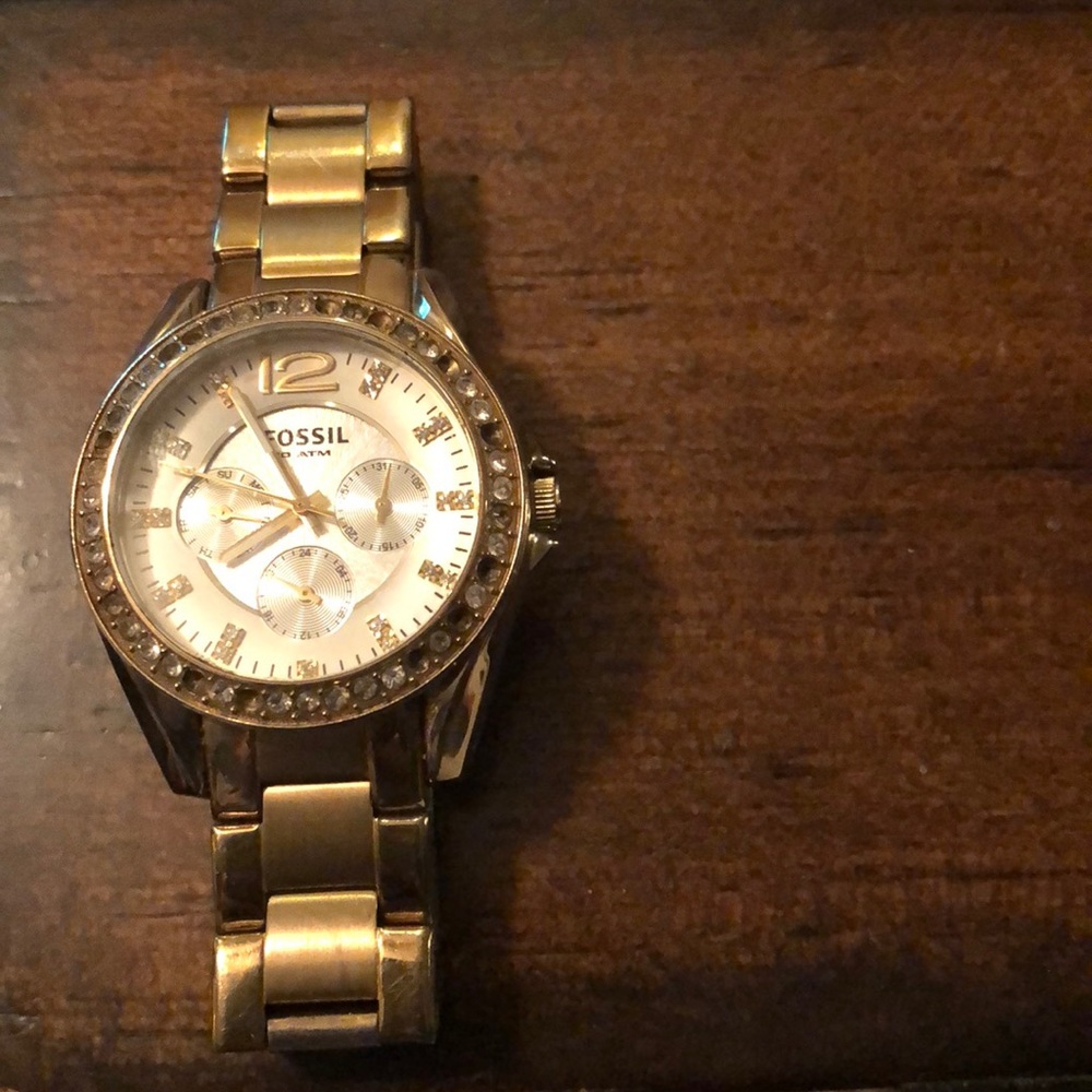 Gold fossil watch